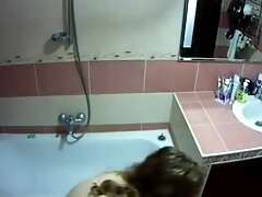 college girl taking shower on